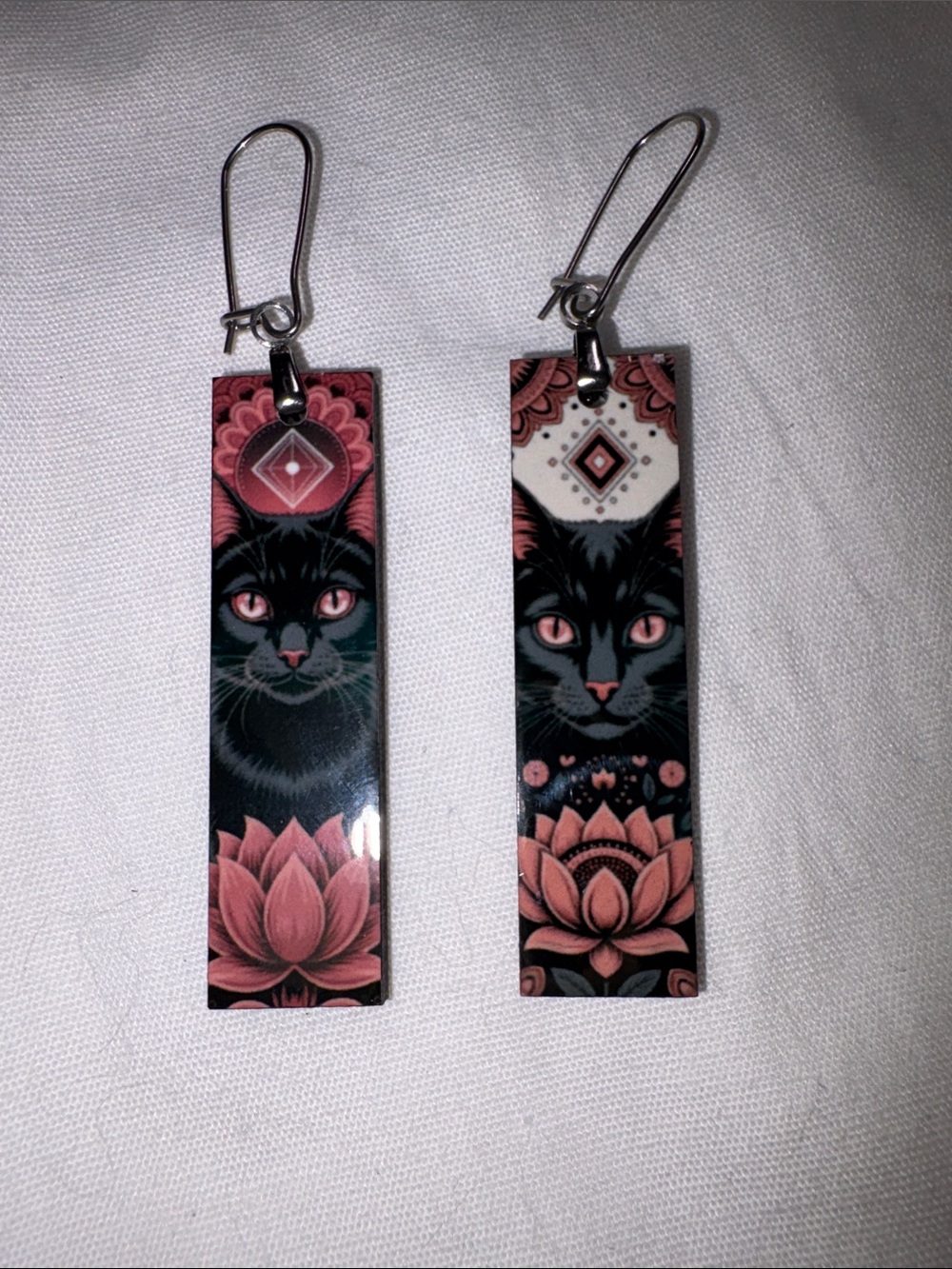 Cat and lotus earrings